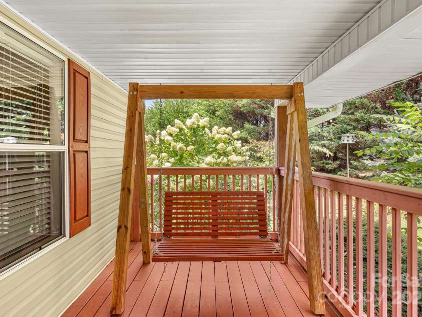 105 Robinson Cove Road, Candler, NC 28715.  MLS# CAR4293915, YatesRealty ID 35076. Front porch