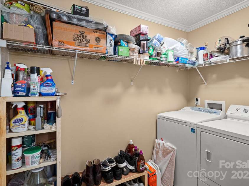 105 Robinson Cove Road, Candler, NC 28715.  MLS# CAR4293915, YatesRealty ID 35076. Laundry room