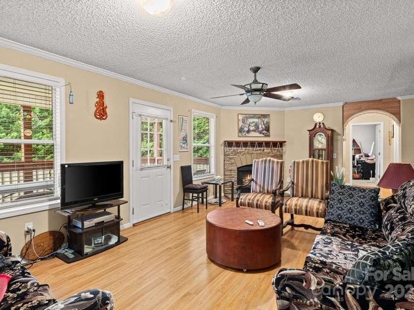 105 Robinson Cove Road, Candler, NC 28715.  MLS# CAR4293915, YatesRealty ID 35076. Living room