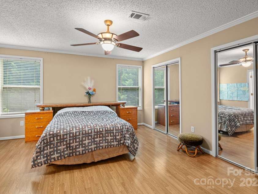105 Robinson Cove Road, Candler, NC 28715.  MLS# CAR4293915, YatesRealty ID 35076. Master bedroom