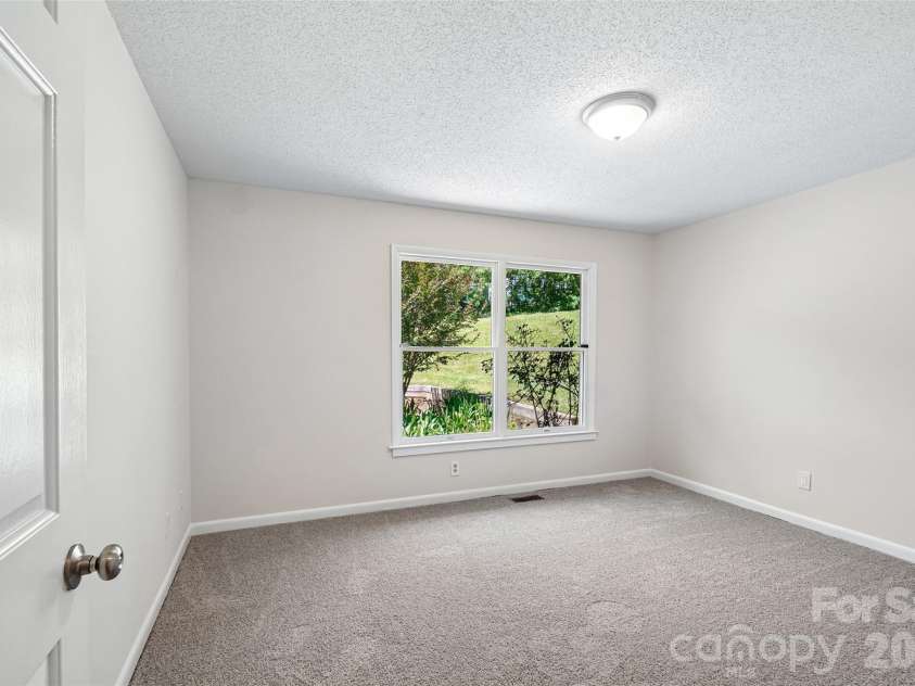 51 Wake Robin Way, Asheville, NC 28805.  MLS# CAR4396887, YatesRealty ID 35080. Staged Photo