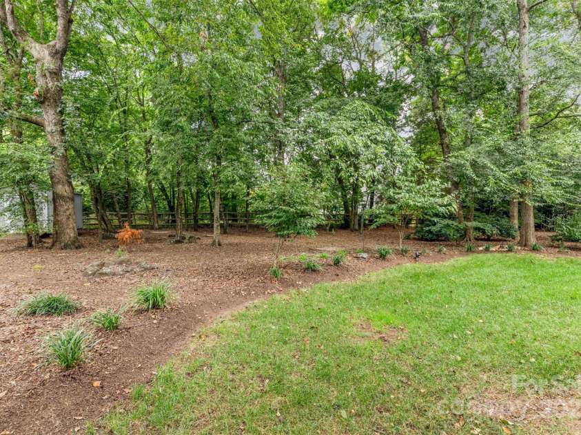 1390 Lloyd Place, Concord, NC 28027.  MLS# CAR4291682, YatesRealty ID 35087. Very Spacious Fenced Yard
