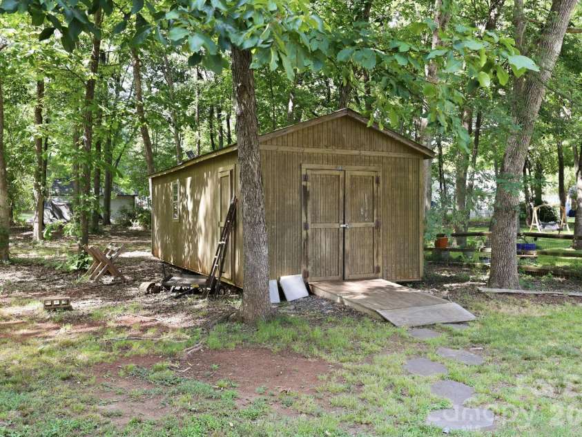 3970 Tenneyson Court, Concord, NC 28027.  MLS# CAR4398947, YatesRealty ID 35089. 12x28 storage shed conveys