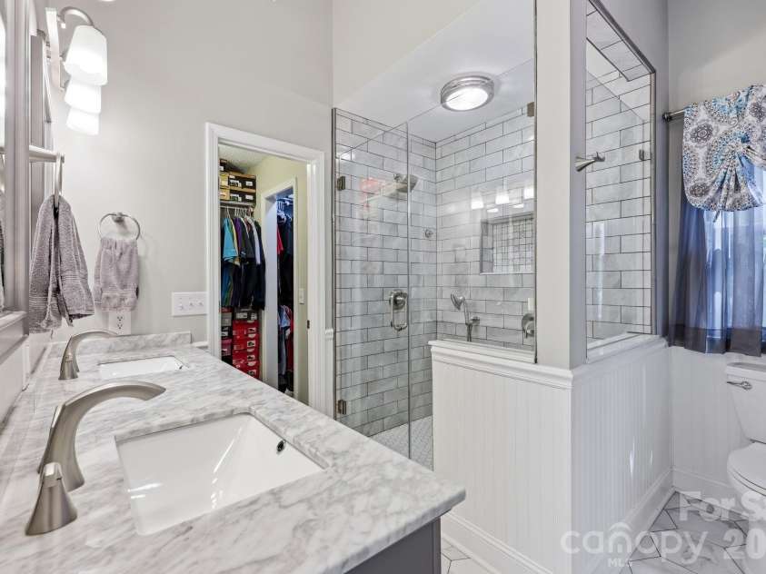 3970 Tenneyson Court, Concord, NC 28027.  MLS# CAR4398947, YatesRealty ID 35089. Primary Bathroom with Dual vanity and walk-in closet
