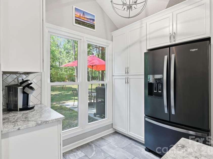 3970 Tenneyson Court, Concord, NC 28027.  MLS# CAR4398947, YatesRealty ID 35089. Second pantry area and coffee station