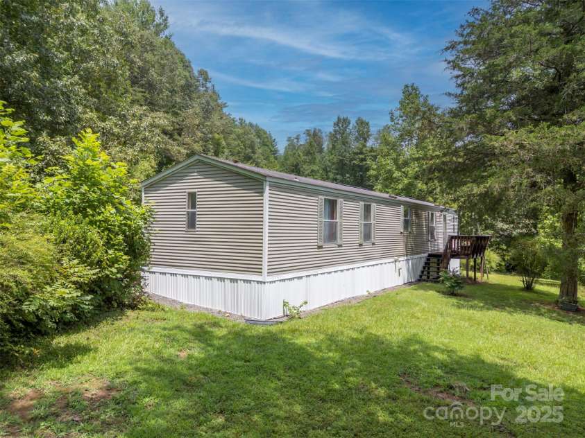 423 Womack Road, Mill Spring, NC 28756.  MLS# CAR4294084, YatesRealty ID 35093. 
