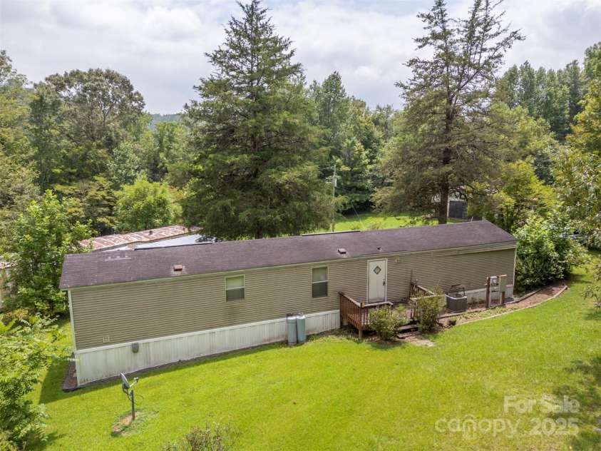 423 Womack Road, Mill Spring, NC 28756.  MLS# CAR4294084, YatesRealty ID 35093. 