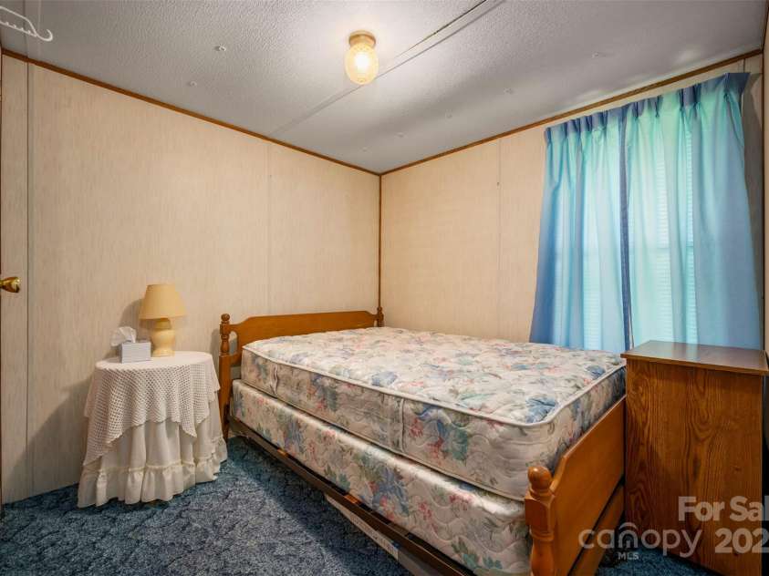 423 Womack Road, Mill Spring, NC 28756.  MLS# CAR4294084, YatesRealty ID 35093. 