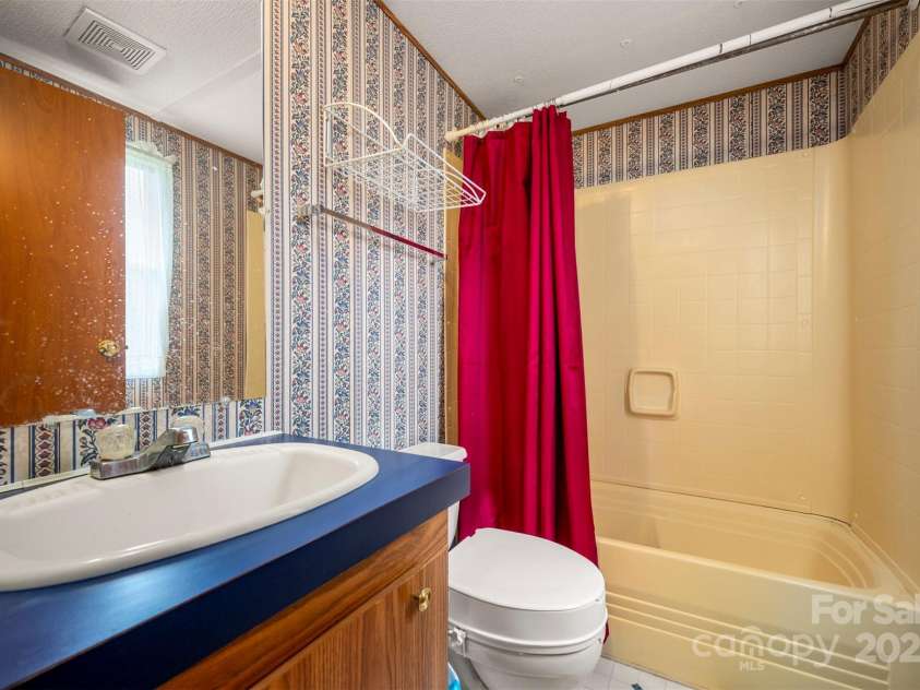 423 Womack Road, Mill Spring, NC 28756.  MLS# CAR4294084, YatesRealty ID 35093. 