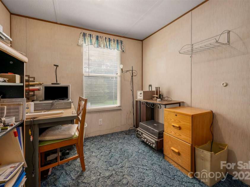 423 Womack Road, Mill Spring, NC 28756.  MLS# CAR4294084, YatesRealty ID 35093. 