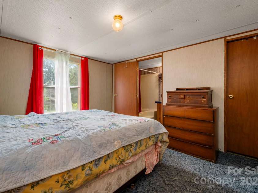 423 Womack Road, Mill Spring, NC 28756.  MLS# CAR4294084, YatesRealty ID 35093. 