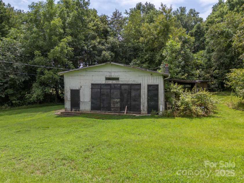 423 Womack Road, Mill Spring, NC 28756.  MLS# CAR4294084, YatesRealty ID 35093. 