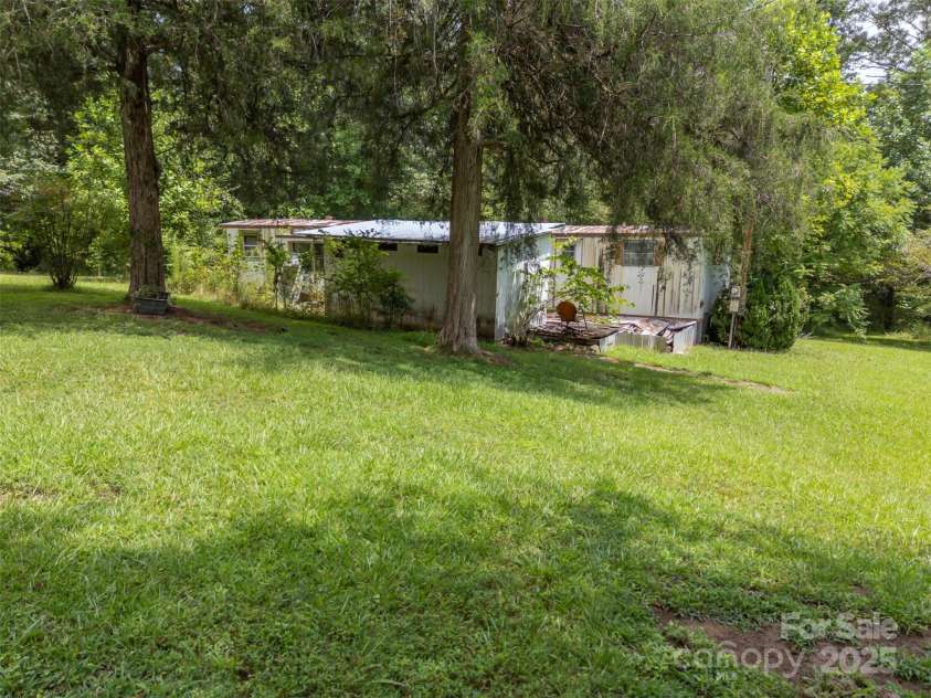 423 Womack Road, Mill Spring, NC 28756.  MLS# CAR4294084, YatesRealty ID 35093. 