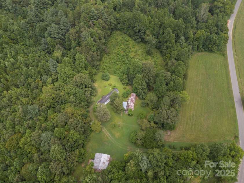 423 Womack Road, Mill Spring, NC 28756.  MLS# CAR4294084, YatesRealty ID 35093. 