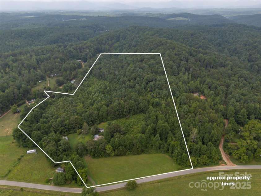 423 Womack Road, Mill Spring, NC 28756.  MLS# CAR4294084, YatesRealty ID 35093. 