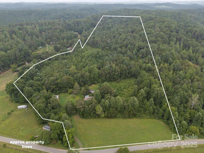 423 Womack Road, Mill Spring, NC 28756.  MLS# CAR4294084, YatesRealty ID 35093. 