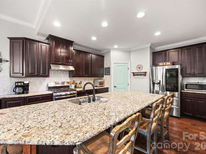 8477 Whitworth Avenue, Harrisburg, NC 28075.  MLS# CAR4399268, YatesRealty ID 35095. Kitchen