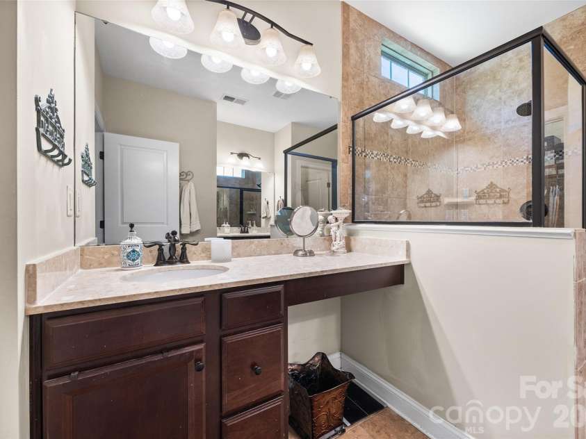 8477 Whitworth Avenue, Harrisburg, NC 28075.  MLS# CAR4399268, YatesRealty ID 35095. Primary Bathroom