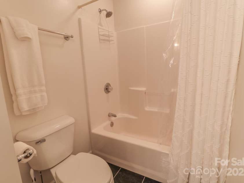 51 Windy Acres Drive, Fairview, NC 28730.  MLS# CAR4297537, YatesRealty ID 35098. Full bath 3rd bedroom