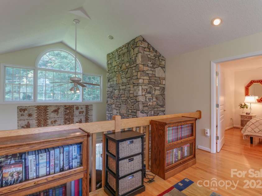 51 Windy Acres Drive, Fairview, NC 28730.  MLS# CAR4297537, YatesRealty ID 35098. Sitting area in lofted landing