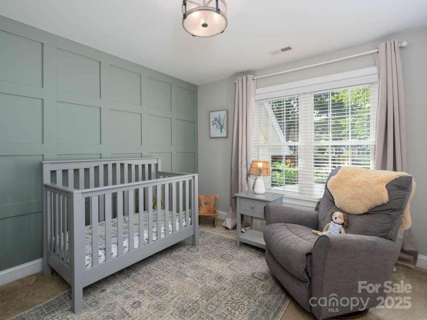 19112 Glouster Court, Cornelius, NC 28031.  MLS# CAR4291361, YatesRealty ID 35099. Accent wall in this peaceful room