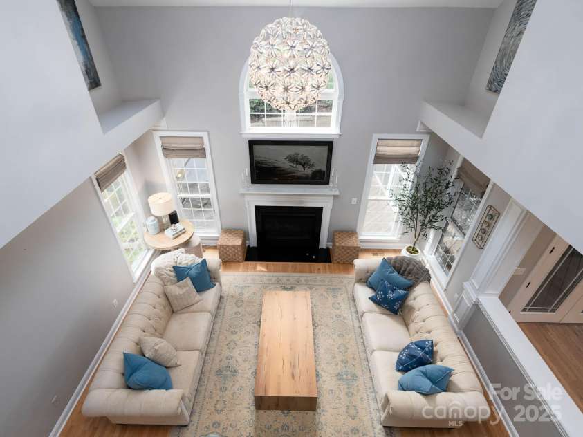 19112 Glouster Court, Cornelius, NC 28031.  MLS# CAR4291361, YatesRealty ID 35099. Bridge to the primary bedroom