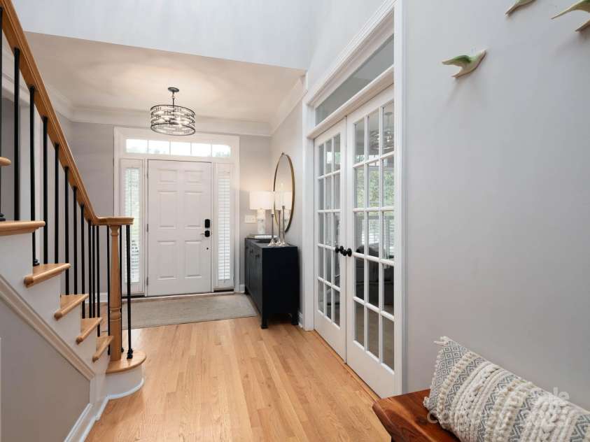 19112 Glouster Court, Cornelius, NC 28031.  MLS# CAR4291361, YatesRealty ID 35099. Inviting foyer and hardwoods greet you.  Close the french doors to your office for privacy