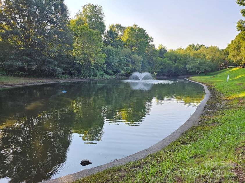19112 Glouster Court, Cornelius, NC 28031.  MLS# CAR4291361, YatesRealty ID 35099. Peaceful pond for your evening walks