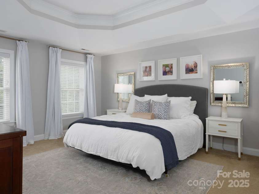 19112 Glouster Court, Cornelius, NC 28031.  MLS# CAR4291361, YatesRealty ID 35099. Primary suite with tray ceiling