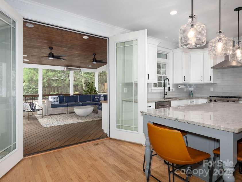 19112 Glouster Court, Cornelius, NC 28031.  MLS# CAR4291361, YatesRealty ID 35099. The amazing porch has 345 sq ft of outdoor space to expand your living area!