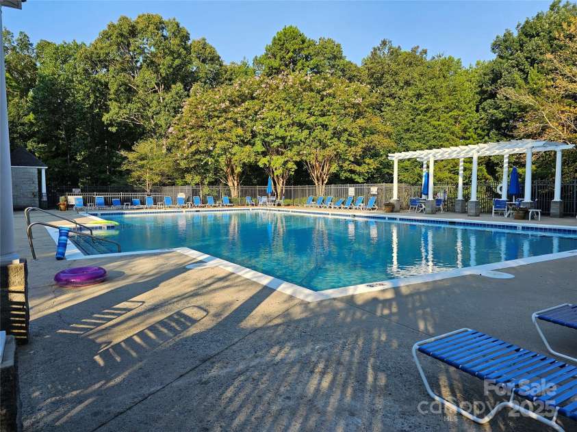 19112 Glouster Court, Cornelius, NC 28031.  MLS# CAR4291361, YatesRealty ID 35099. The community pool for hot summer days and meeting neighbors