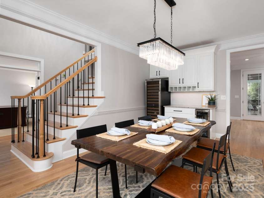 19112 Glouster Court, Cornelius, NC 28031.  MLS# CAR4291361, YatesRealty ID 35099. The dining room is enhanced by beautiful built-in custom cabinets.