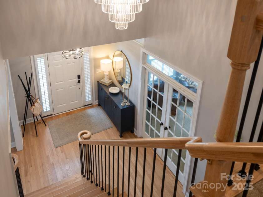 19112 Glouster Court, Cornelius, NC 28031.  MLS# CAR4291361, YatesRealty ID 35099. Undapted lighting fixtures throughout
