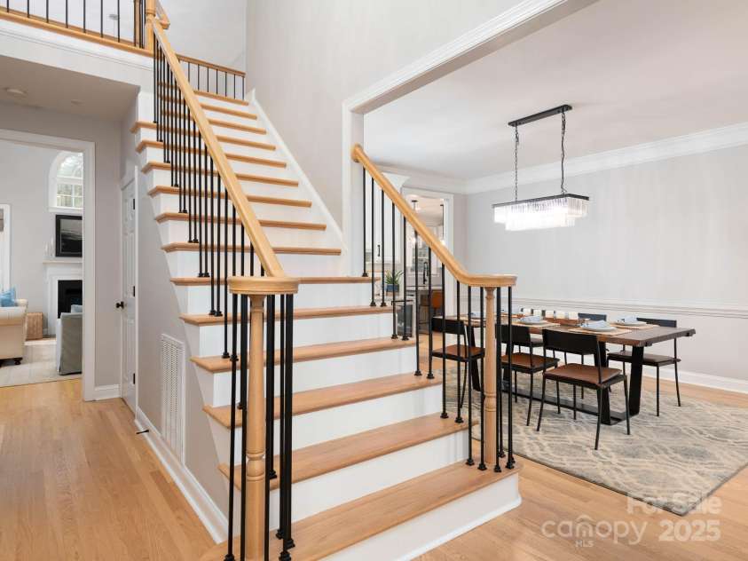 19112 Glouster Court, Cornelius, NC 28031.  MLS# CAR4291361, YatesRealty ID 35099. Updates throughout the home include metal stair balusters and lighting fixtures