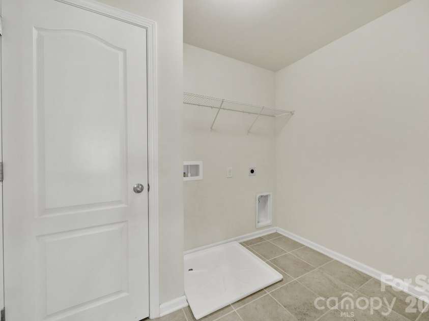 10328 Ebbets Road, Charlotte, NC 28273.  MLS# CAR4409878, YatesRealty ID 35104. Laundry Room