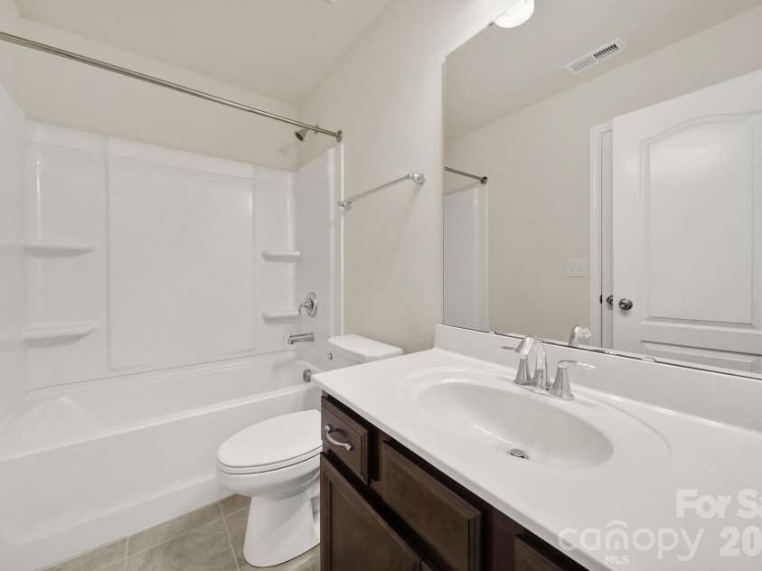 10328 Ebbets Road, Charlotte, NC 28273.  MLS# CAR4409878, YatesRealty ID 35104. Secondary Bathroom