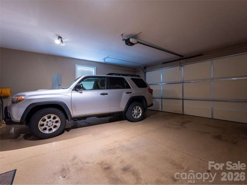 25 Linden Turn, Hendersonville, NC 28739.  MLS# CAR4387037, YatesRealty ID 35110. Garage main level