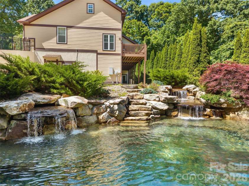 25 Linden Turn, Hendersonville, NC 28739.  MLS# CAR4387037, YatesRealty ID 35110. Waterfall feature