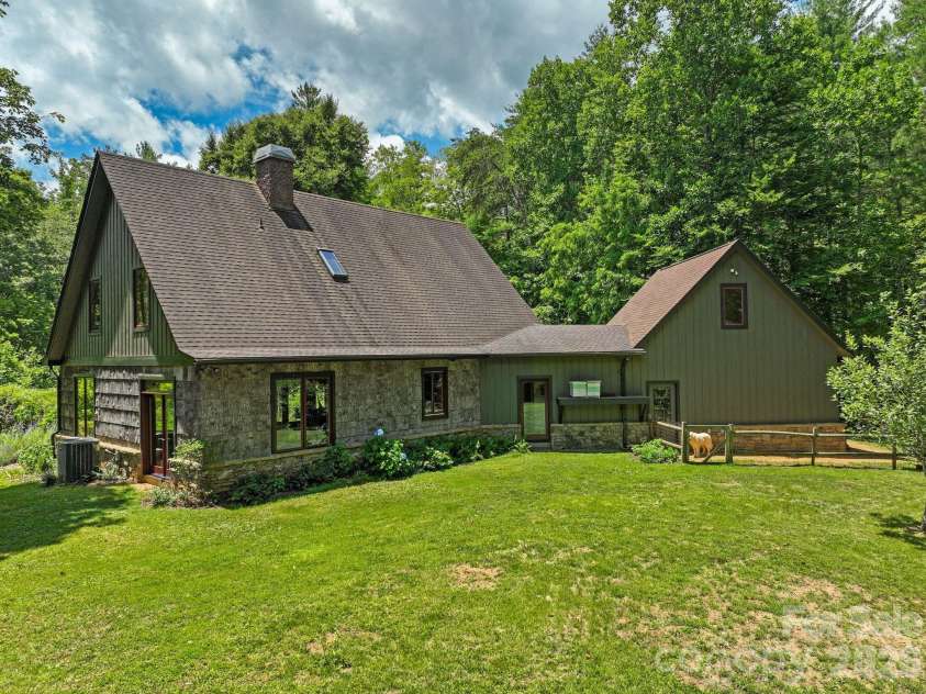 24 Merriwood Trail, Arden, NC 28704.  MLS# CAR4396503, YatesRealty ID 35111. Level rear yard ready for fun
