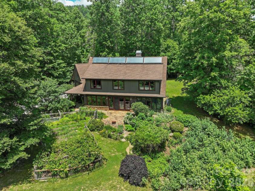 24 Merriwood Trail, Arden, NC 28704.  MLS# CAR4396503, YatesRealty ID 35111. Mature landscaping