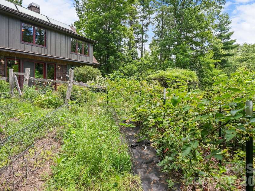 24 Merriwood Trail, Arden, NC 28704.  MLS# CAR4396503, YatesRealty ID 35111. Mature landscaping