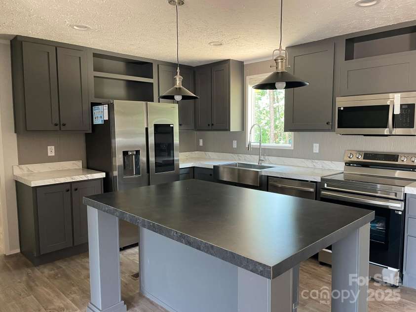 4164 Tallent Road, Morganton, NC 28655.  MLS# CAR4272693, YatesRealty ID 35113. 