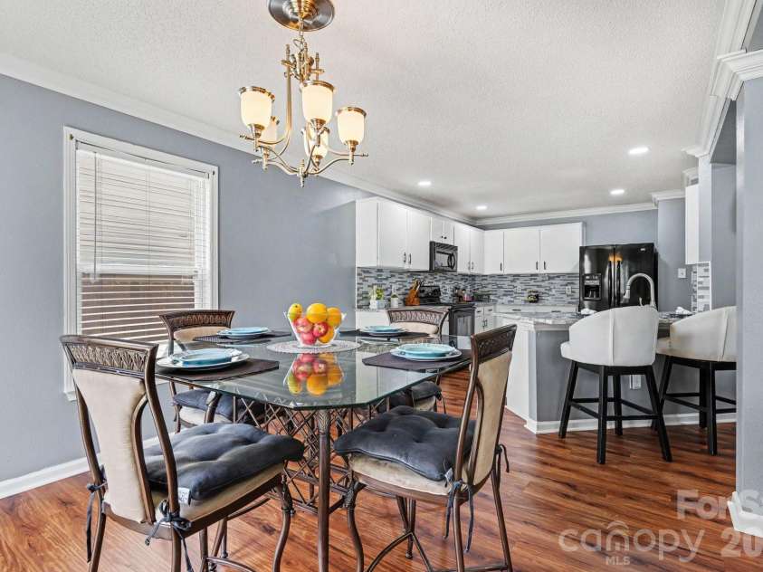 5654 Hammermill Drive, Harrisburg, NC 28075.  MLS# CAR4390875, YatesRealty ID 35116. Eating area