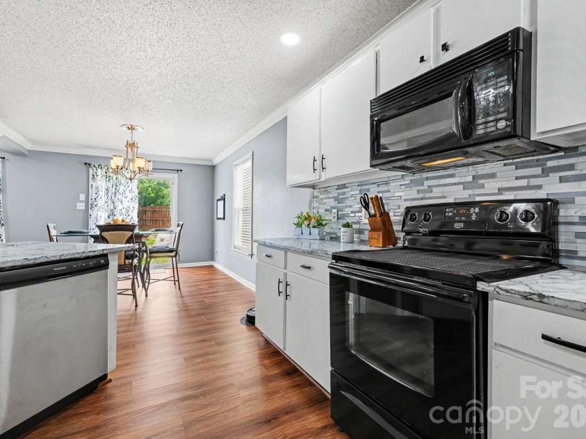 5654 Hammermill Drive, Harrisburg, NC 28075.  MLS# CAR4390875, YatesRealty ID 35116. Kitchen