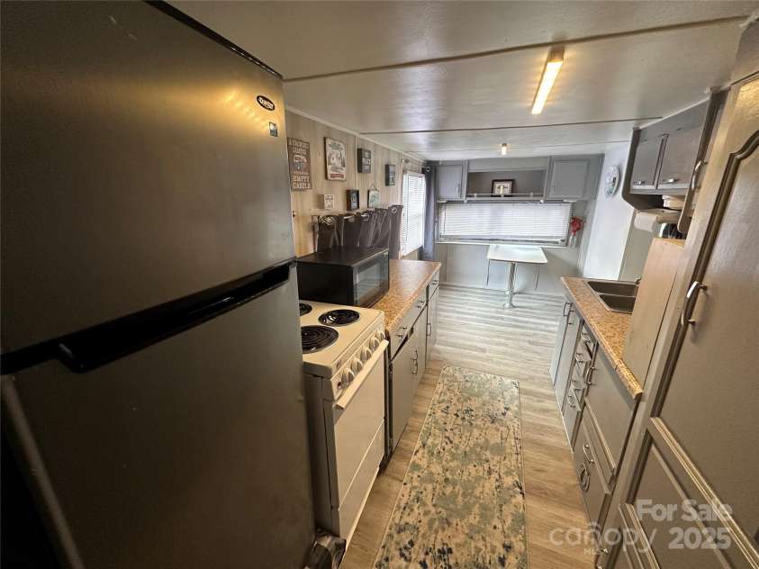 105 Marina Lane, New London, NC 28127.  MLS# CAR4276987, YatesRealty ID 3512. 