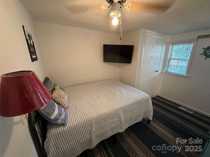 105 Marina Lane, New London, NC 28127.  MLS# CAR4276987, YatesRealty ID 3512. 