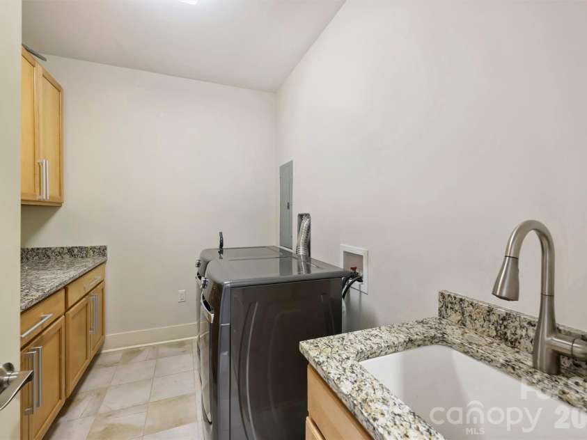 222 Caldwell Street, Charlotte, NC 28202.  MLS# CAR4378860, YatesRealty ID 3512. Laundry Room with Storage