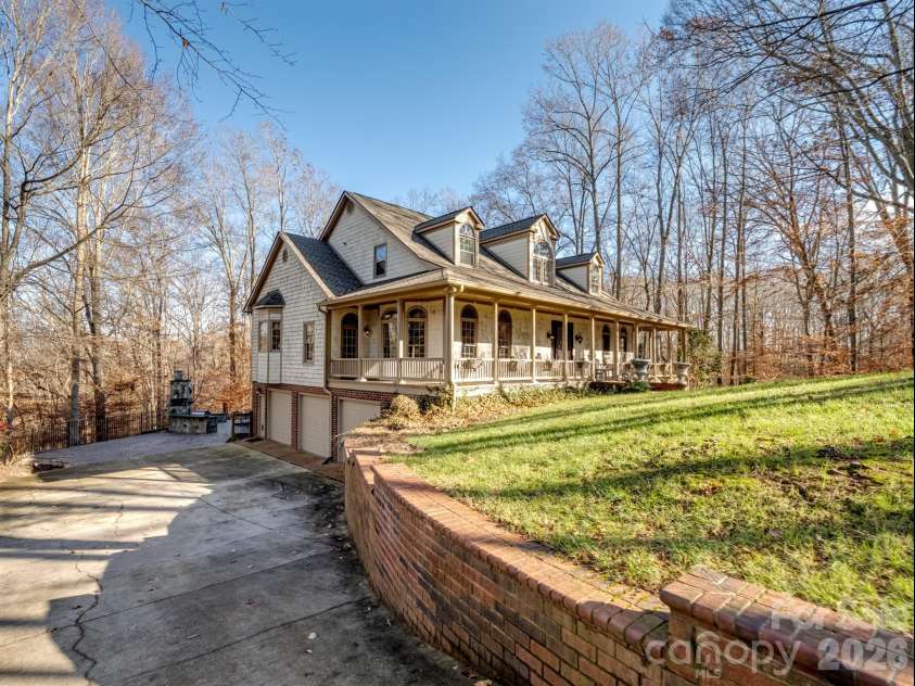 1090 Saunders Drive, Catawba, NC 28609.  MLS# CAR4386981, YatesRealty ID 35123. A spacious three-car attached garage accommodates all your vehicles with ease.