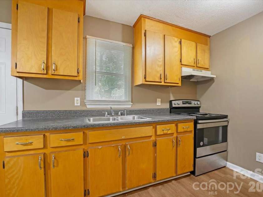 100 Gilmer Street, Gastonia, NC 28052.  MLS# CAR4399181, YatesRealty ID 35124. Kitchen