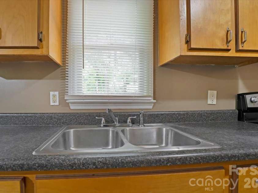 100 Gilmer Street, Gastonia, NC 28052.  MLS# CAR4399181, YatesRealty ID 35124. Kitchen